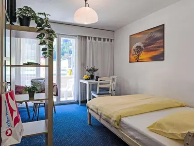Ein Bett oder Betten in einem Zimmer der Unterkunft Studio BeKb-Gebäude Studio No02 by Interhome