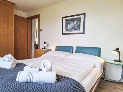 Ein Bett oder Betten in einem Zimmer der Unterkunft Apartment Chalet Schöpfli by Interhome