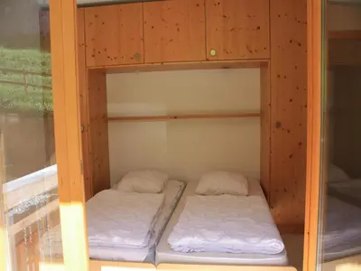 Ein Bett oder Betten in einem Zimmer der Unterkunft Charming apartment with ski storage