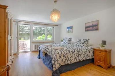 Ein Bett oder Betten in einem Zimmer der Unterkunft Riverside Apartment