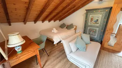 Ein Bett oder Betten in einem Zimmer der Unterkunft Charmante maisonnette avec jardin