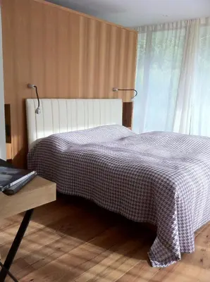 Ein Bett oder Betten in einem Zimmer der Unterkunft Chalet Park Apartment mit Sauna Hamam