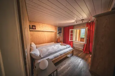 Ein Bett oder Betten in einem Zimmer der Unterkunft EIGERMAGIC Chalet Wartstein