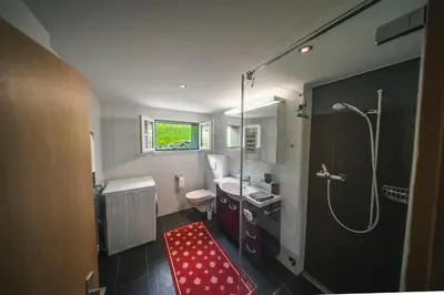 Ein Badezimmer in der Unterkunft EIGERMAGIC Chalet Wartstein