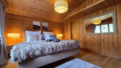 Ein Bett oder Betten in einem Zimmer der Unterkunft Alpine Loft, Central, Balcony, Parking, Family,PS5
