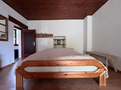 Ein Bett oder Betten in einem Zimmer der Unterkunft Schönes Rustico in bester Lage - 2 min an den See