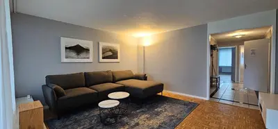 Ein Sitzbereich in der Unterkunft Garden Suite Thun