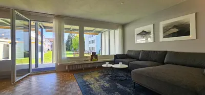Ein Sitzbereich in der Unterkunft Garden Suite Thun