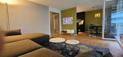 Ein Sitzbereich in der Unterkunft Garden Suite Thun
