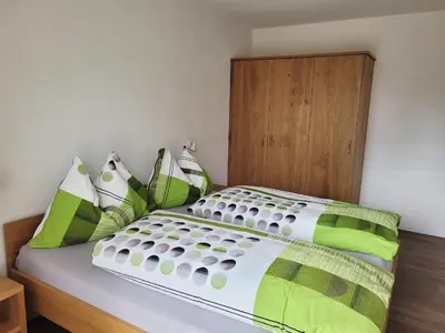 Ein Bett oder Betten in einem Zimmer der Unterkunft Haus Perle