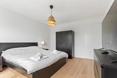 Ein Bett oder Betten in einem Zimmer der Unterkunft Bel appartement rénové avec vue, à Savièse