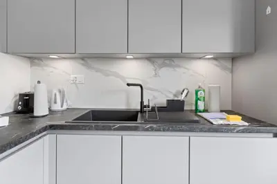 Küche/Küchenzeile in der Unterkunft Bel appartement rénové avec vue, à Savièse