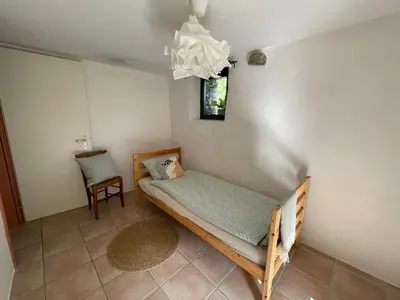 Ein Bett oder Betten in einem Zimmer der Unterkunft Cozy Rustic Prato Sornico