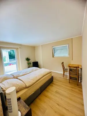 Ein Bett oder Betten in einem Zimmer der Unterkunft Modern and cozy studio