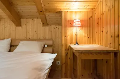 Ein Bett oder Betten in einem Zimmer der Unterkunft Sunny and spacious apartment in chalet Faigaux in Veysonnaz situated in quiet area with magnificent mountain views