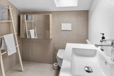 Ein Badezimmer in der Unterkunft Attique rénové avec jacuzzi 6 pers à Savièse