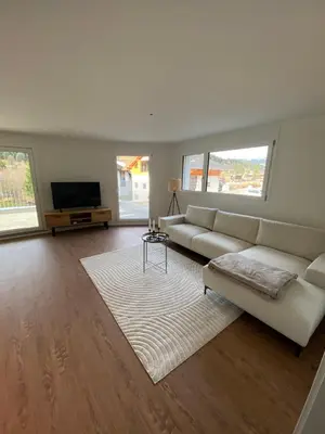 Ein Sitzbereich in der Unterkunft Abendrot- grosse moderne und stilvolle Ferienwohnung im Bergdorf Sörenberg