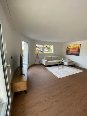 Ein Sitzbereich in der Unterkunft Abendrot- grosse moderne und stilvolle Ferienwohnung im Bergdorf Sörenberg