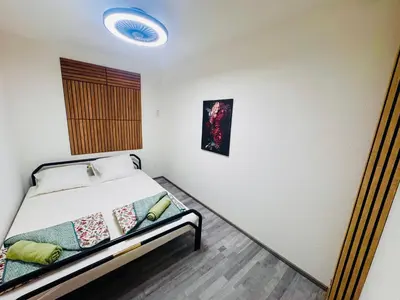 Ein Bett oder Betten in einem Zimmer der Unterkunft Villa Lakeview Appartment Tomori