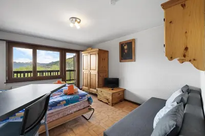 Ein Sitzbereich in der Unterkunft Arnica 2 - 2 pers - piscine