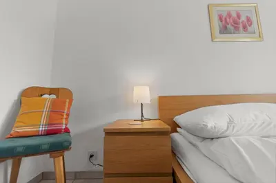 Ein Bett oder Betten in einem Zimmer der Unterkunft Vue, 2 terrasses & parking privé - Saas-Grund