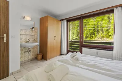 Ein Bett oder Betten in einem Zimmer der Unterkunft Vue, 2 terrasses & parking privé - Saas-Grund