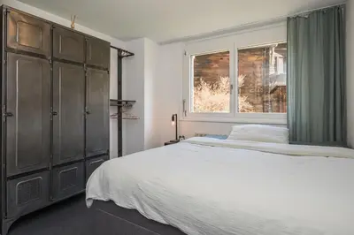 Ein Bett oder Betten in einem Zimmer der Unterkunft Cosy apartment for 2 people in Zermatt