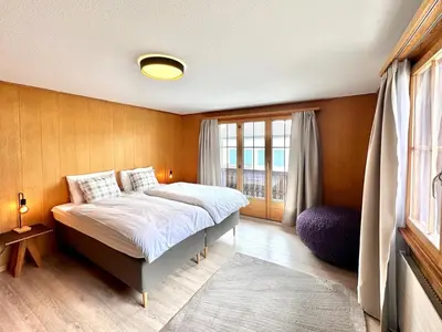 Ein Bett oder Betten in einem Zimmer der Unterkunft Chalet Gemsblick