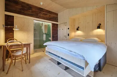 Ein Bett oder Betten in einem Zimmer der Unterkunft La cabanotel de Ferpècle