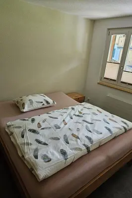 Ein Bett oder Betten in einem Zimmer der Unterkunft Apartment Bergecho EG Mitte by Interhome