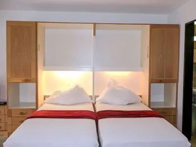 Ein Bett oder Betten in einem Zimmer der Unterkunft Apartment Pasadena-6 by Interhome