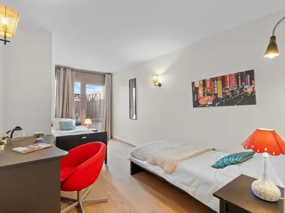 Ein Bett oder Betten in einem Zimmer der Unterkunft Apartment Jeanne D'Arc LOFT COMBI by Interhome