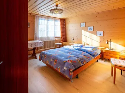 Ein Bett oder Betten in einem Zimmer der Unterkunft Apartment Berna 2- Stock by Interhome