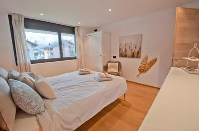 Ein Bett oder Betten in einem Zimmer der Unterkunft Chalet Sunnustrahl