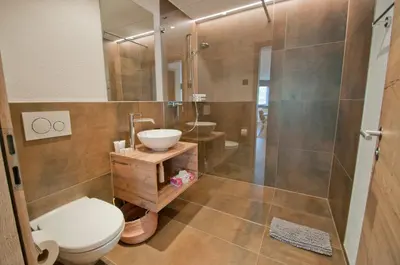 Ein Badezimmer in der Unterkunft Chalet Sunnustrahl