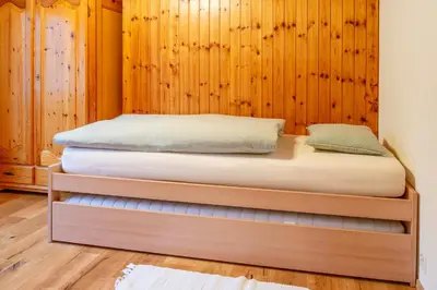 Ein Bett oder Betten in einem Zimmer der Unterkunft Ferienwohnung Gabschi