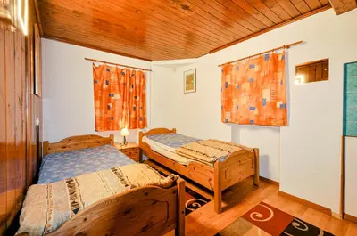 Ein Bett oder Betten in einem Zimmer der Unterkunft Chalet Les Bardeaux