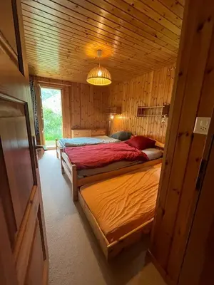 Ein Bett oder Betten in einem Zimmer der Unterkunft Appartement avec jardin au coeur de la nature
