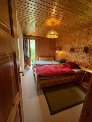 Ein Bett oder Betten in einem Zimmer der Unterkunft Appartement avec jardin au coeur de la nature