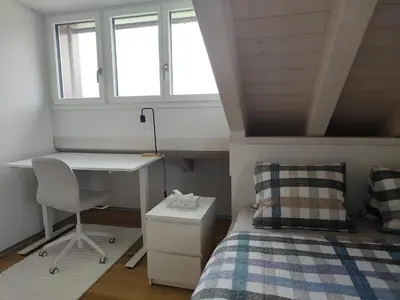 Ein Bett oder Betten in einem Zimmer der Unterkunft Entire house 20 min from Interlaken