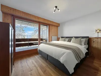 Ein Bett oder Betten in einem Zimmer der Unterkunft Ultimate Condo - 4 Valleys - Ski-in out - Swiss Alps
