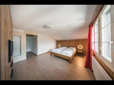 Ein Bett oder Betten in einem Zimmer der Unterkunft ALPINEMAGIC Chalet Wartstein