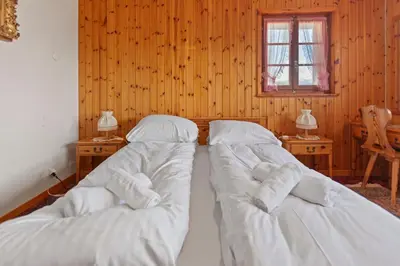Ein Bett oder Betten in einem Zimmer der Unterkunft Sauna, nature & parking privé - Vercorin, 10 pers