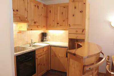 Küche/Küchenzeile in der Unterkunft Bel Alp 2 Appartement avec jardin Evolene