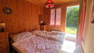 Ein Bett oder Betten in einem Zimmer der Unterkunft La Granzeta - Chalet- Authentique - Evolene