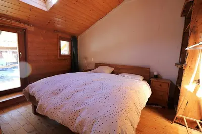 Ein Bett oder Betten in einem Zimmer der Unterkunft Chalet Berthe 11