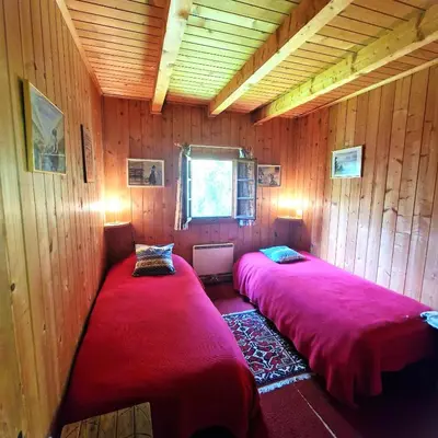 Ein Bett oder Betten in einem Zimmer der Unterkunft Tourbillon Gerber - Chalet authentique La Sage