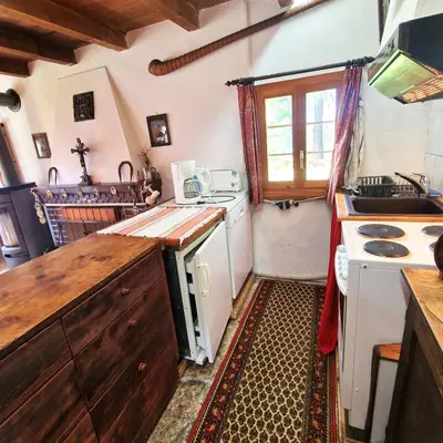 Küche/Küchenzeile in der Unterkunft Tourbillon Gerber - Chalet authentique La Sage