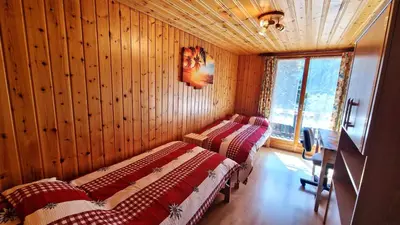 Ein Bett oder Betten in einem Zimmer der Unterkunft Beau Sejour 2 - Appartement 6 personnes - Evolene