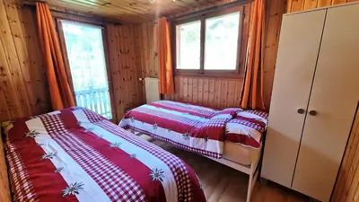 Ein Bett oder Betten in einem Zimmer der Unterkunft Beau Sejour 2 - Appartement 6 personnes - Evolene